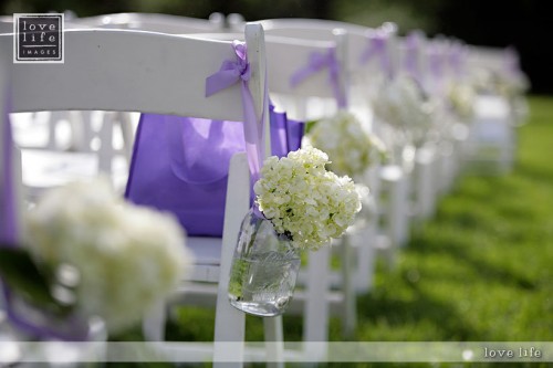 Using Mason Jars as centerpieces wedding Chairflowers