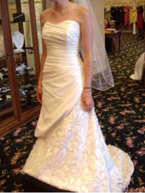 does this hair style match the style of my dress? :  wedding Dress