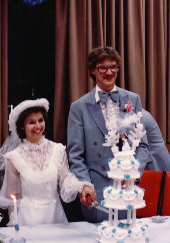 Do you have any pictures of your parents' wedding? : wedding Cutting The Cake