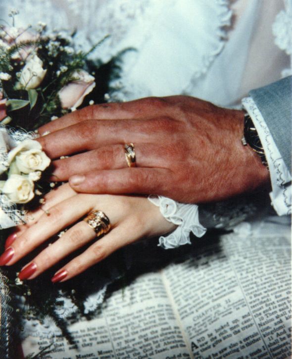 Do you have any pictures of your parents' wedding? : wedding Hands