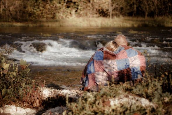 My camping themed engagement photos :  wedding camping theme engagement photos outdoors river field tent quilt 3