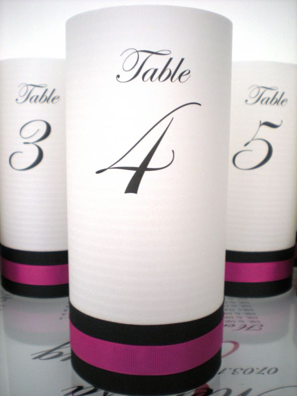 What is everyone using for table Number holders wedding ta ble Lumies 3