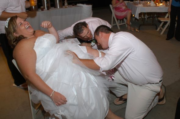 Who is tossing the garter or even wearing one?  I'm on the fence about this! :  wedding garter garter toss DSC 0191