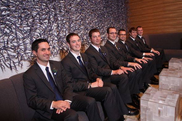 The guys wore charcoal gray suits for our wedding with navy BM dresses