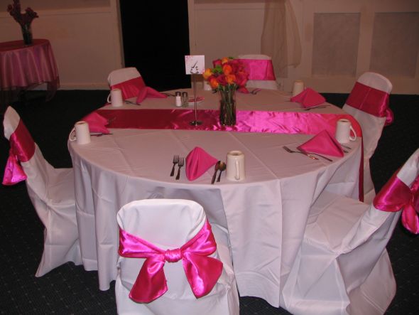 Round table showing table number stands Pink Fuchsia wedding sale 