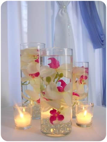 filling with water and putting an orchid down in it with a floating candle