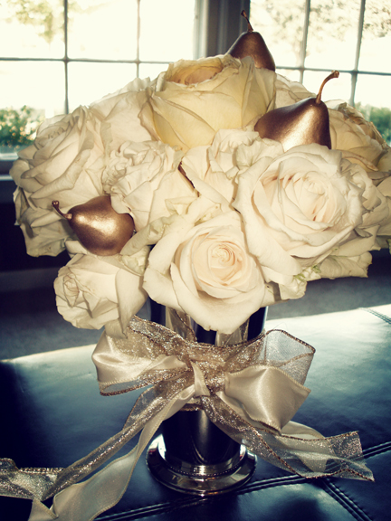 For my centerpieces I wanted to include cream roses champagne garden roses