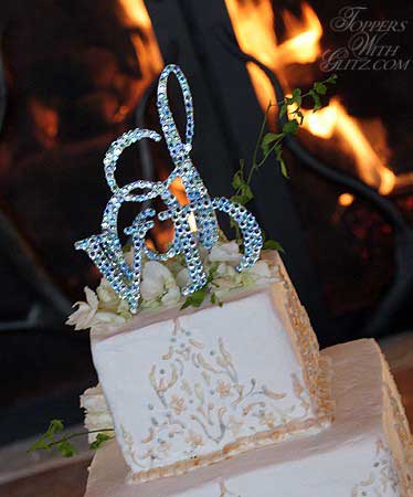 I mean you had your jewel encrusted monogram Cake Topper Love wedding 