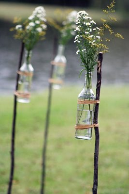 Ceremony decor idea needed :  wedding Glass Jars Tied To Sticks