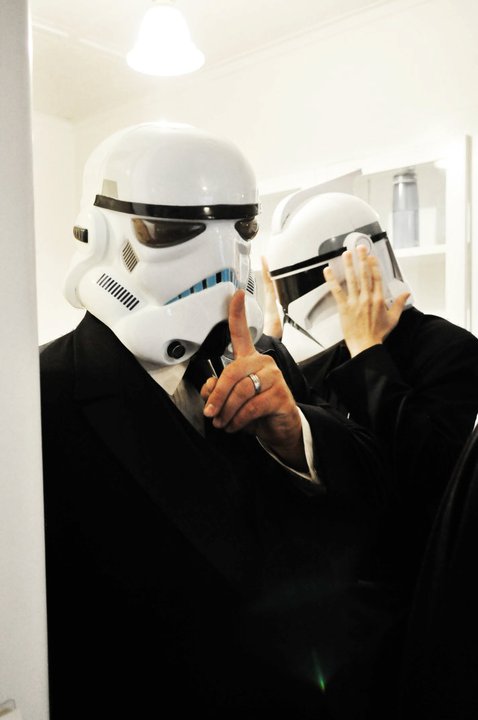 A couple of Groomsmen wearing their storm trooper helmets Oct 2010 wedding