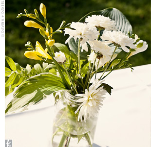 Need Help Choosing a Color Scheme to compliment Sunflowers : wedding sunflower blue yellow blue pink yellow Centerpiec