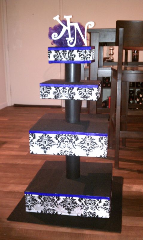 I have made a Damask cupcake tower enough for 100 cupcakes with purple 