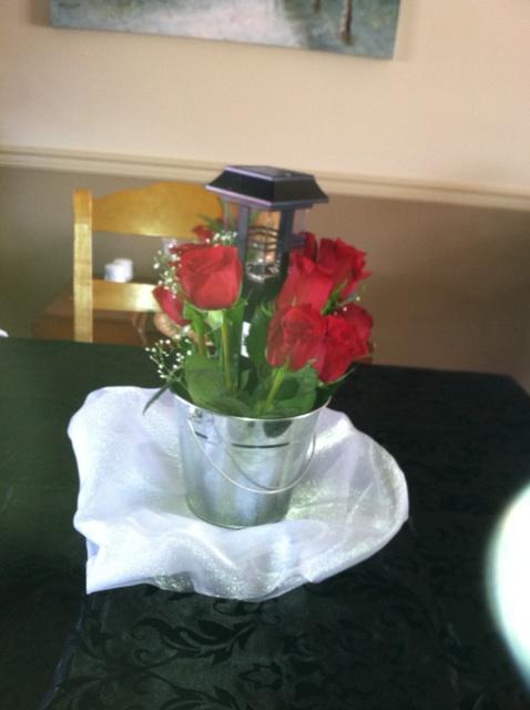We have centerpieces wedding centerpieces roses flowers black white red