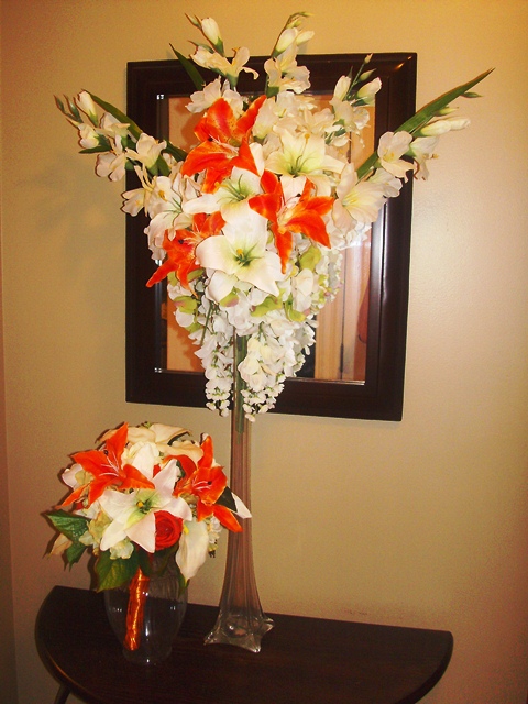 Used these as centerpieces alternated red orange floating flowers and 