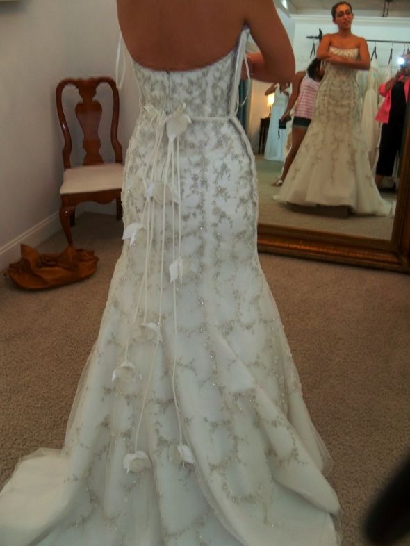 I dont think i'm going to wear a veil, anyone else out there?? :  wedding accessories veil Backofdress