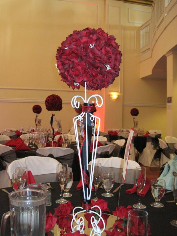 Our colors were black ivory and red This particular centerpiece was a