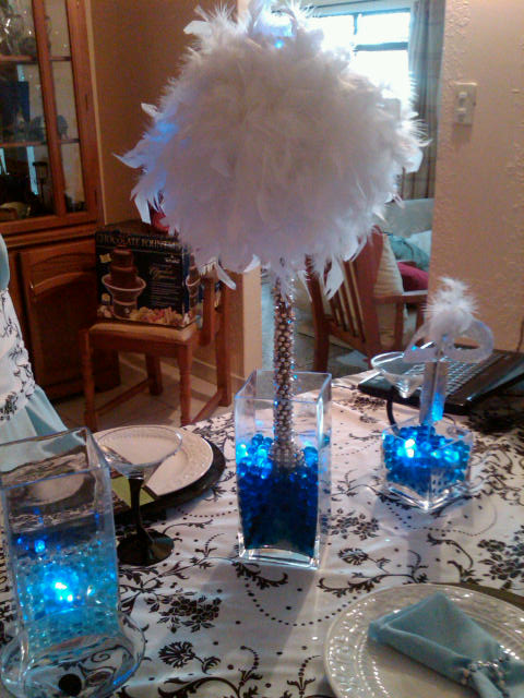 Its a boaadded some hanging crystals feather centerpieces wedding 