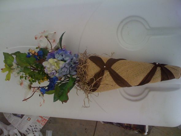 The cone decor are 19 in total length I tied the burlap cones to the pews 