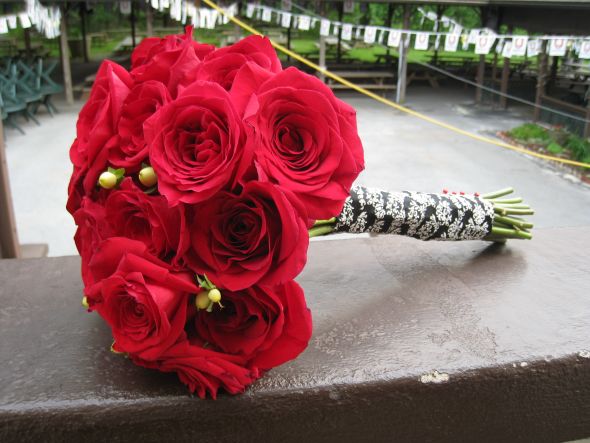 This is a photo of my bouquet2 dozen red roses hand tied and wrapped 