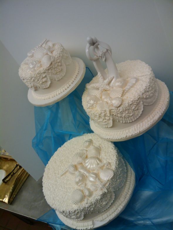 Is anyone else having a reception back home after their destination wedding? :  wedding Cake