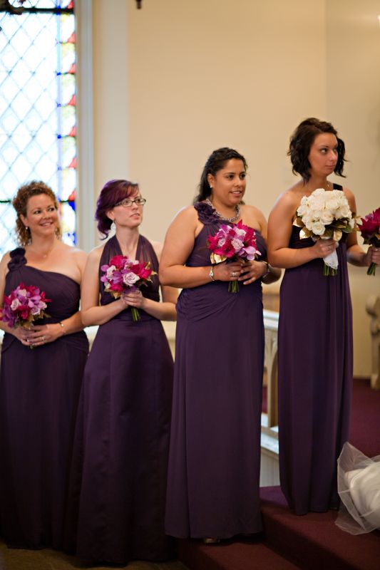 The bouquets were magenta gladiolus purple orchids and lavendar roses with 