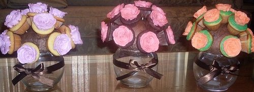 I don't care if people think these are cheesy, I so want cupcake centerpieces :) :  wedding A0a3636d2db7c190 SDC10526.xxlarge