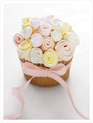 I don't care if people think these are cheesy, I so want cupcake centerpieces :) :  wedding Martha Stewart Cupcakes Roses
